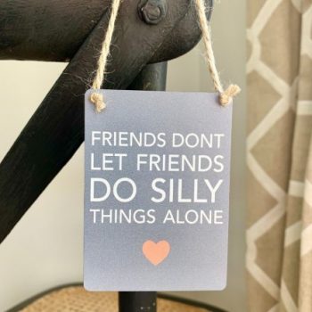 Silly metal sign